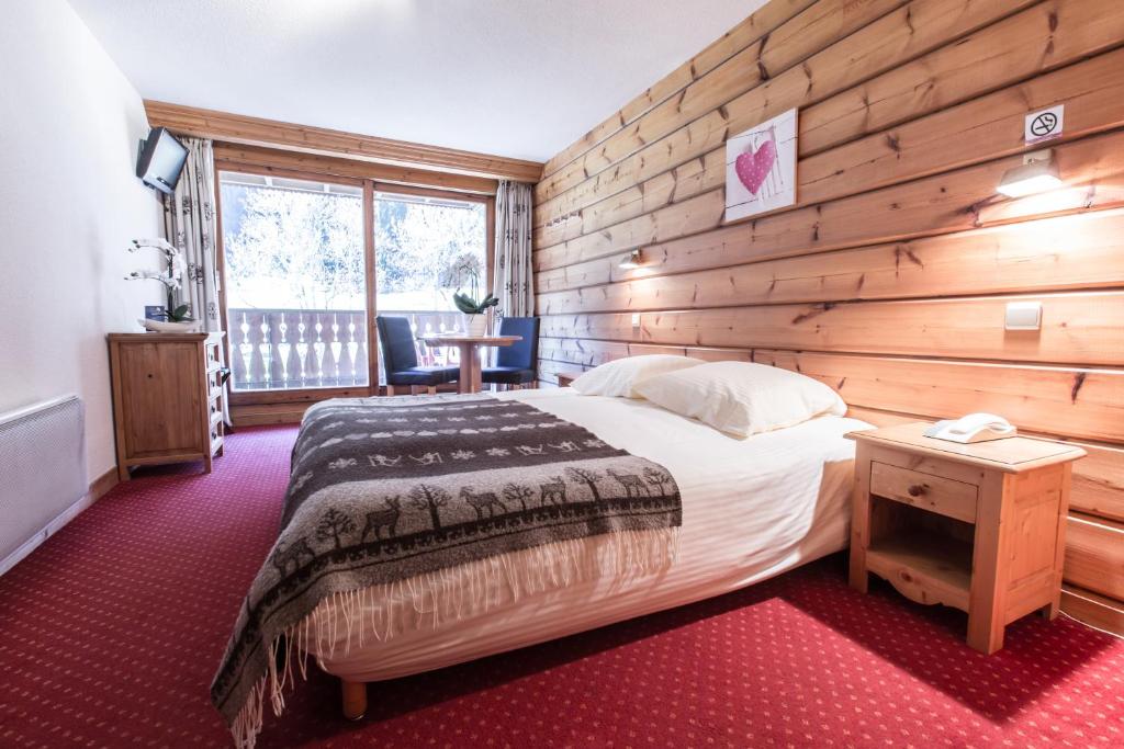 Chambre Hôtel Club Le Crêt Hôtel Névé Spa à Morzine