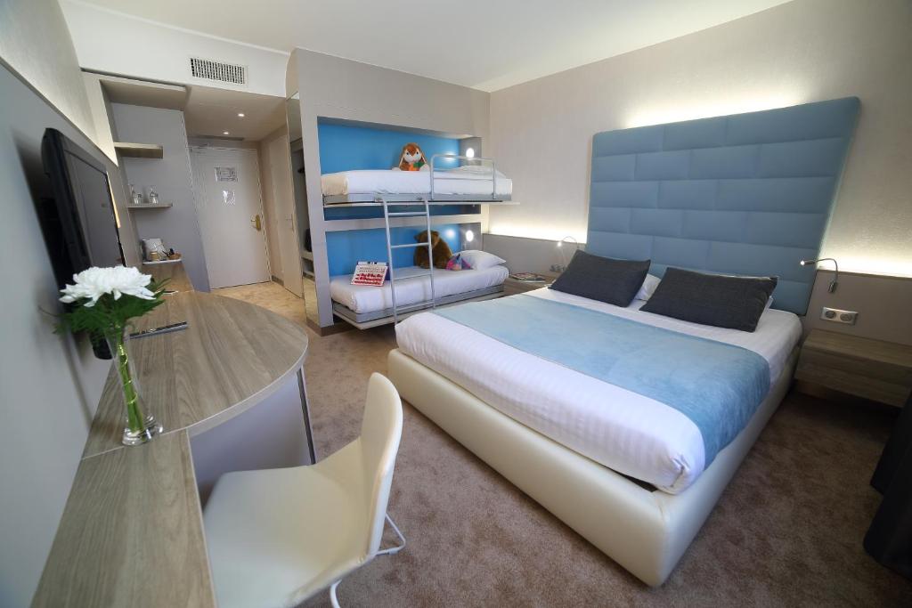 Chambre Hôtel Plaza - site du Futuroscope Hôtels Spa à Chasseneuil-du-Poitou