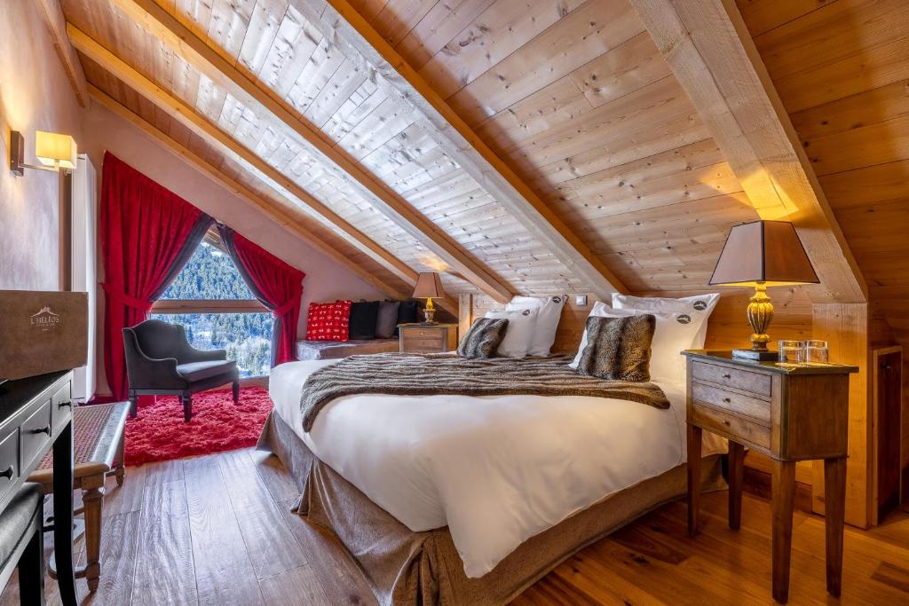 Chambre Hôtel l'Hélios Le Coucou Méribel & Spa Le Mottaret à Méribel