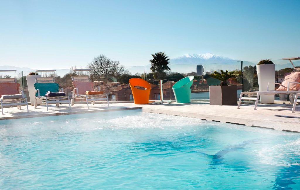 Piscine Relais et Châteaux Thalasso &Ile de la Lagune Hôtel Spa sur la Lagune à Saint-Cyprien