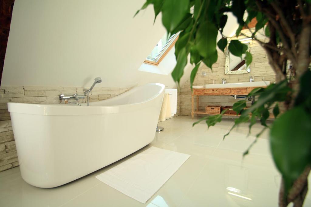 Salle de bains Hôtel Spa Le Miel des Muses Hôtel Spa à Brive-la-Gaillarde